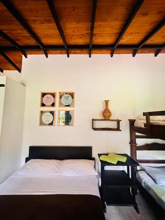 A bed or beds in a room at Casa Hotel Camino Real