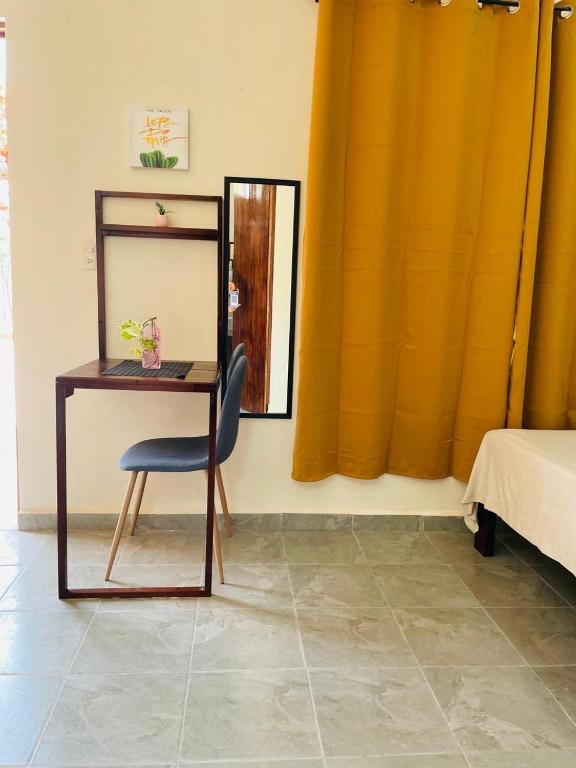 Postel nebo postele na pokoji v ubytování Beryllos Bacalar