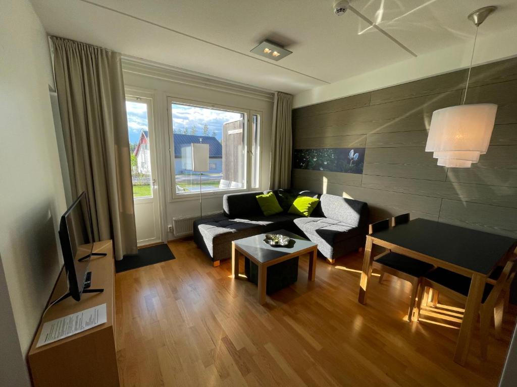 Гостиная зона в Vuokatti Chalets Aarni