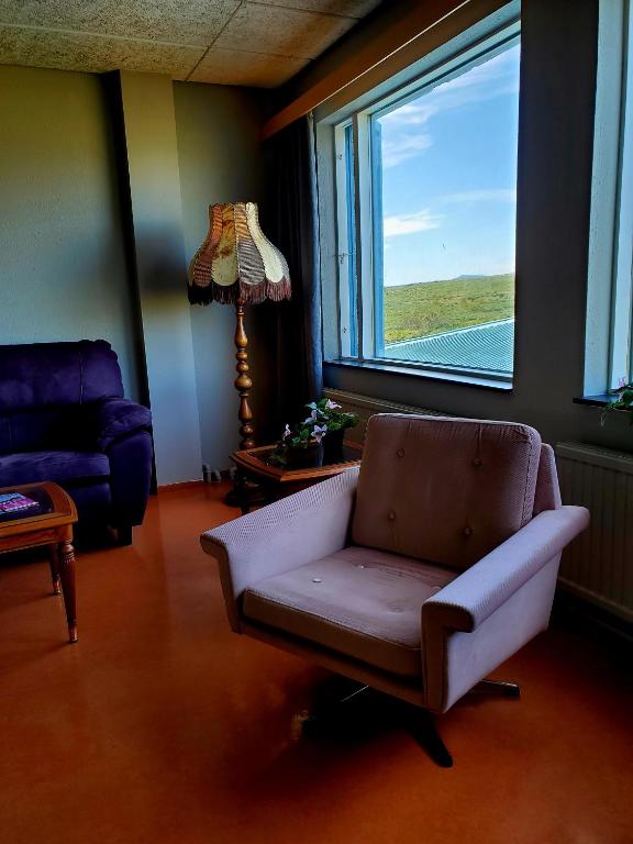 Area soggiorno di Víðines Guesthouse
