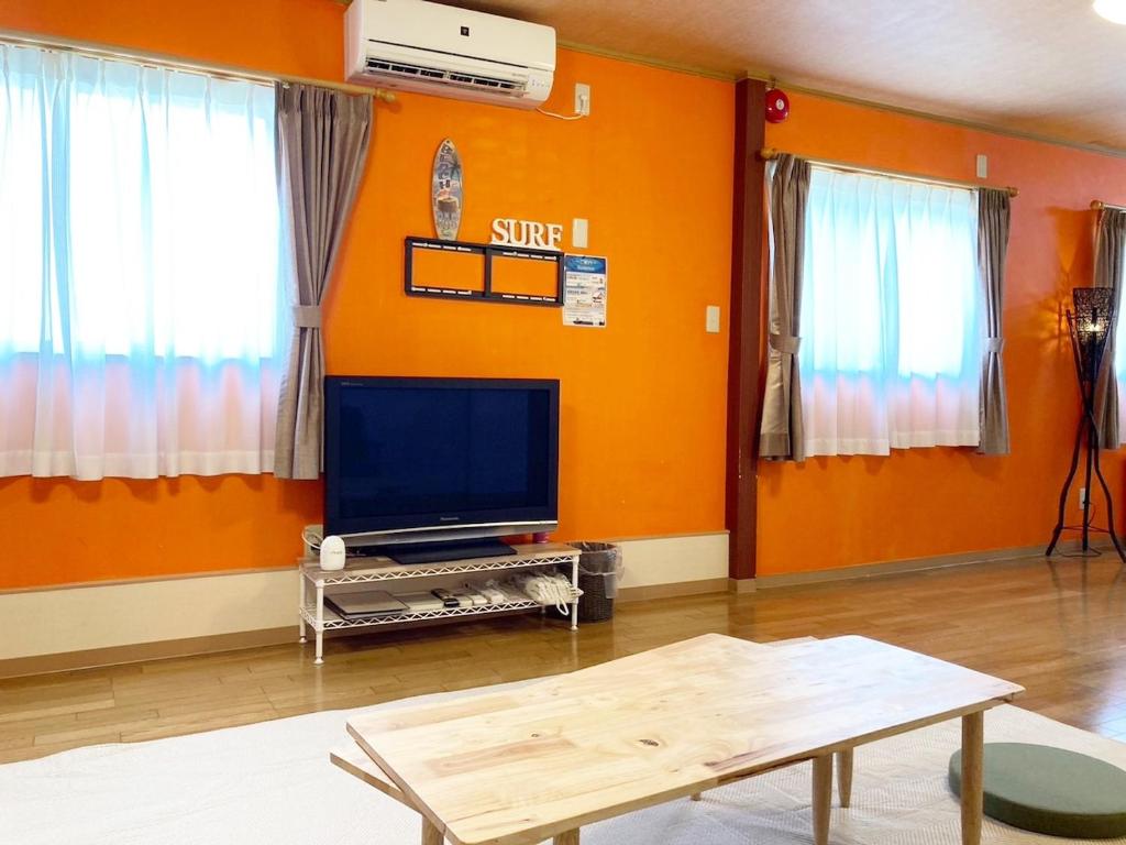TV a/nebo společenská místnost v ubytování Seaside Pension Petit Shirahama