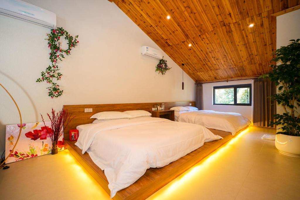 Postel nebo postele na pokoji v ubytování 楊家小院