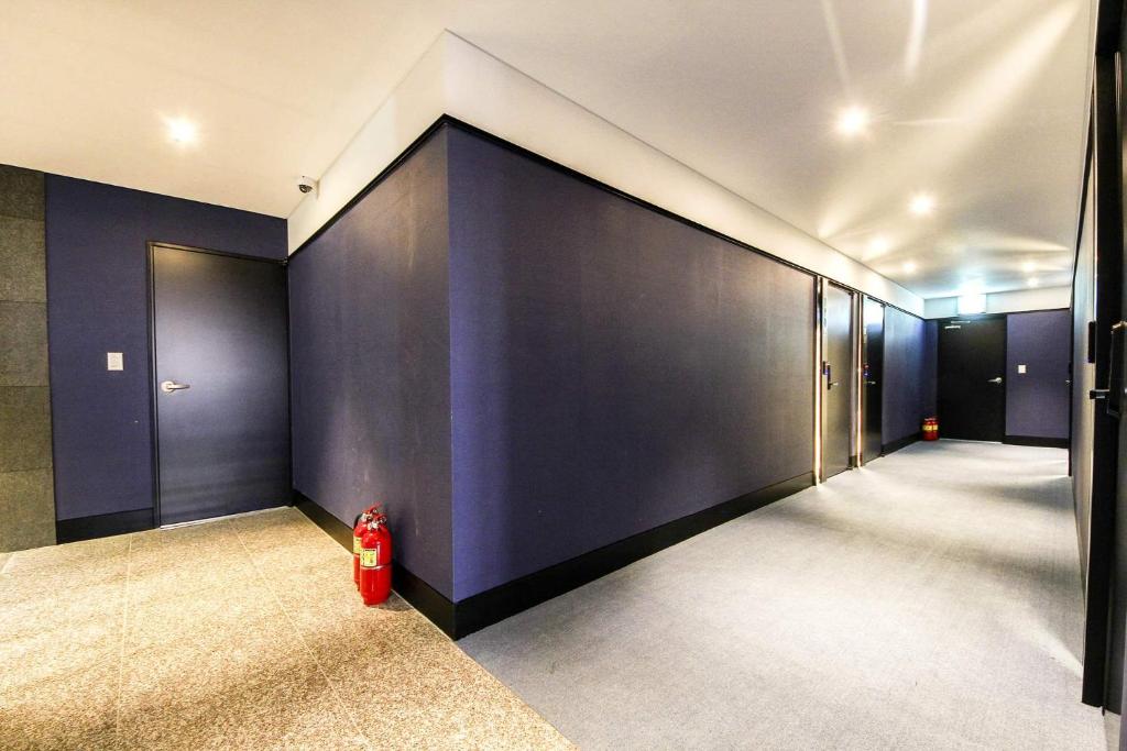 Postel nebo postele na pokoji v ubytování Coco Hotel