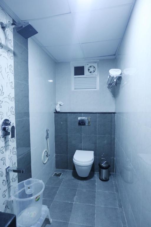 Koupelna v ubytování Hotel Kek Grand Pvt Ltd