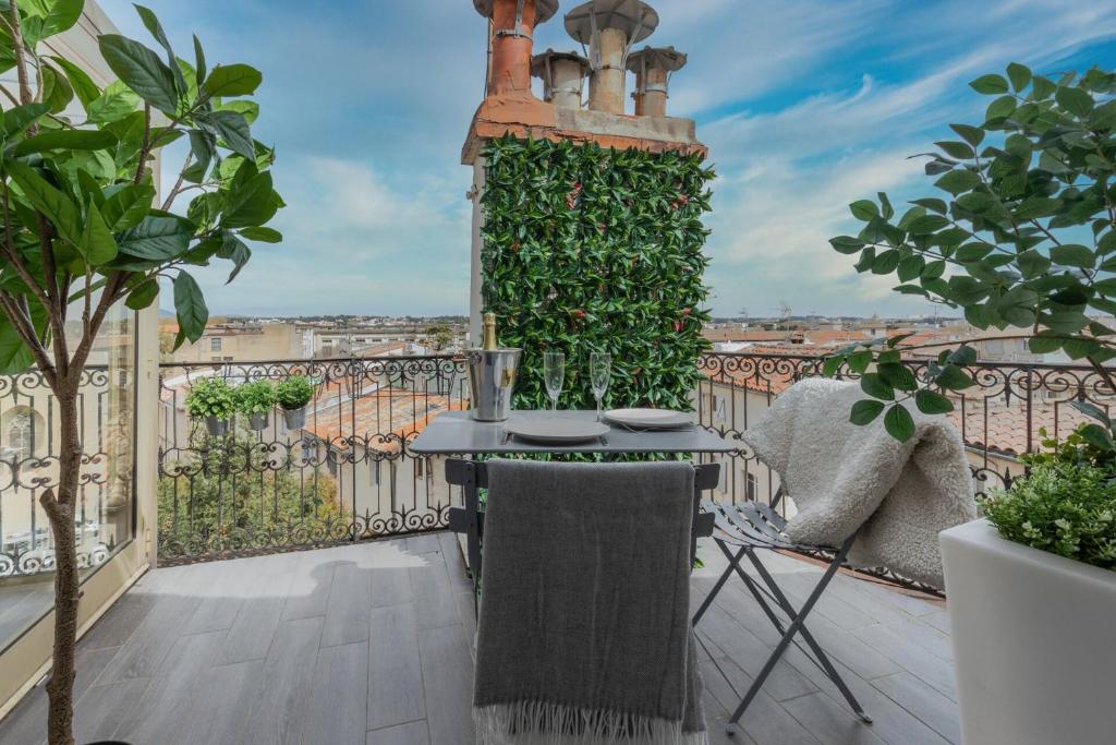 Balkón nebo terasa v ubytování La terrasse, vue sur les toits de Montpellier