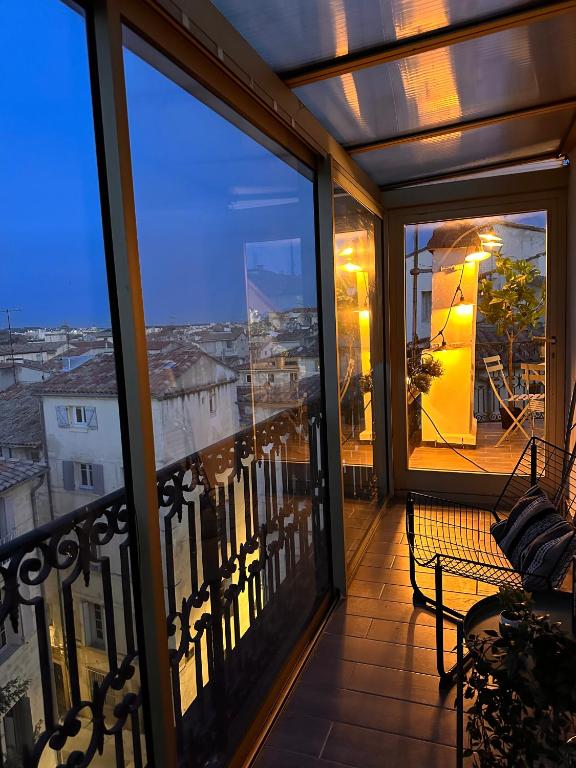 Balkón nebo terasa v ubytování La terrasse, vue sur les toits de Montpellier
