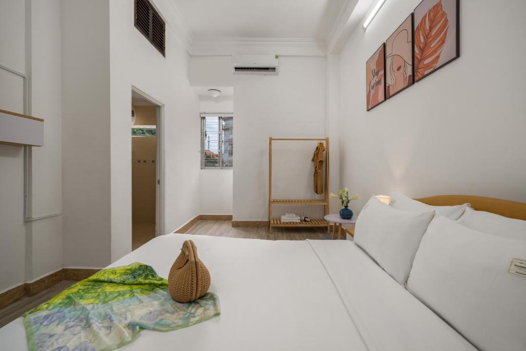 Postel nebo postele na pokoji v ubytování KLy Apartment Hotel