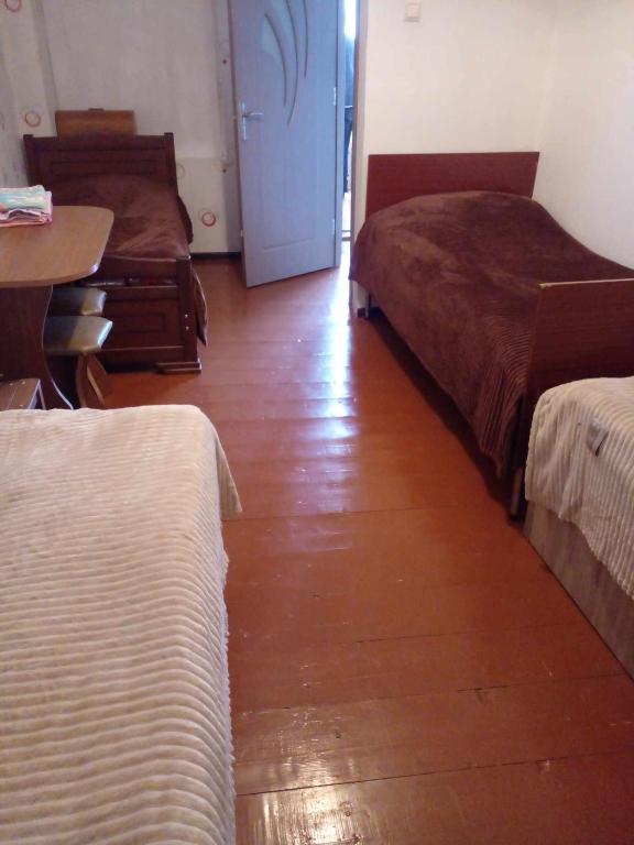 Letto o letti in una camera di Iamze's Guest House