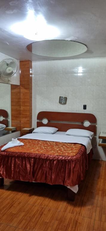 Letto o letti in una camera di Hostal Private-Lima Aiport