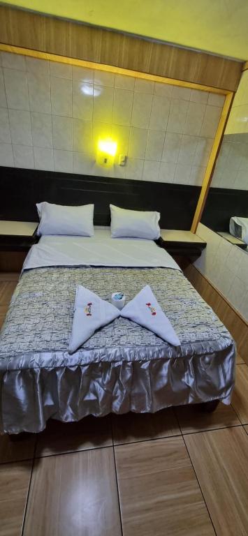 Letto o letti in una camera di Hostal Private-Lima Aiport
