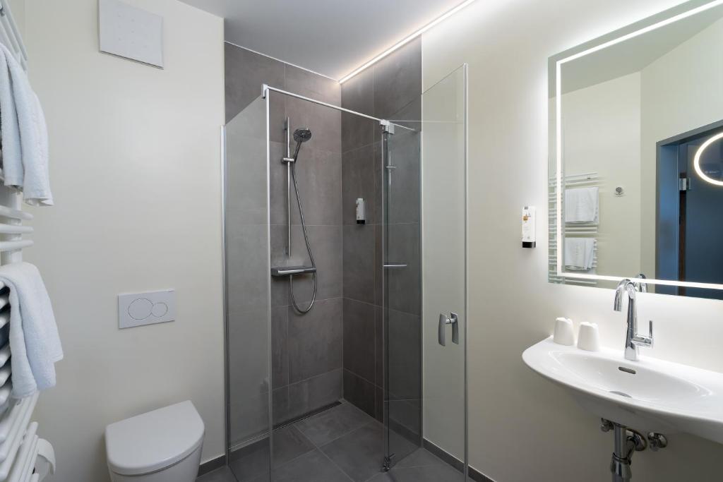 Kúpeľňa v ubytovaní City Hotel Stockerau