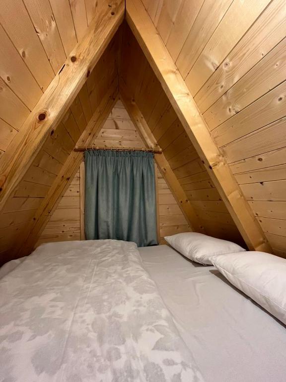 Postel nebo postele na pokoji v ubytování Bisland