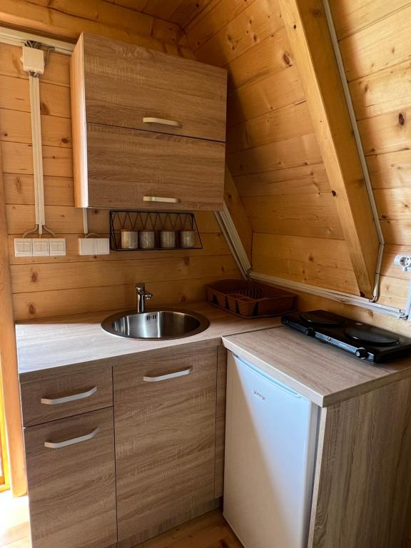 Kuchyň nebo kuchyňský kout v ubytování Bisland