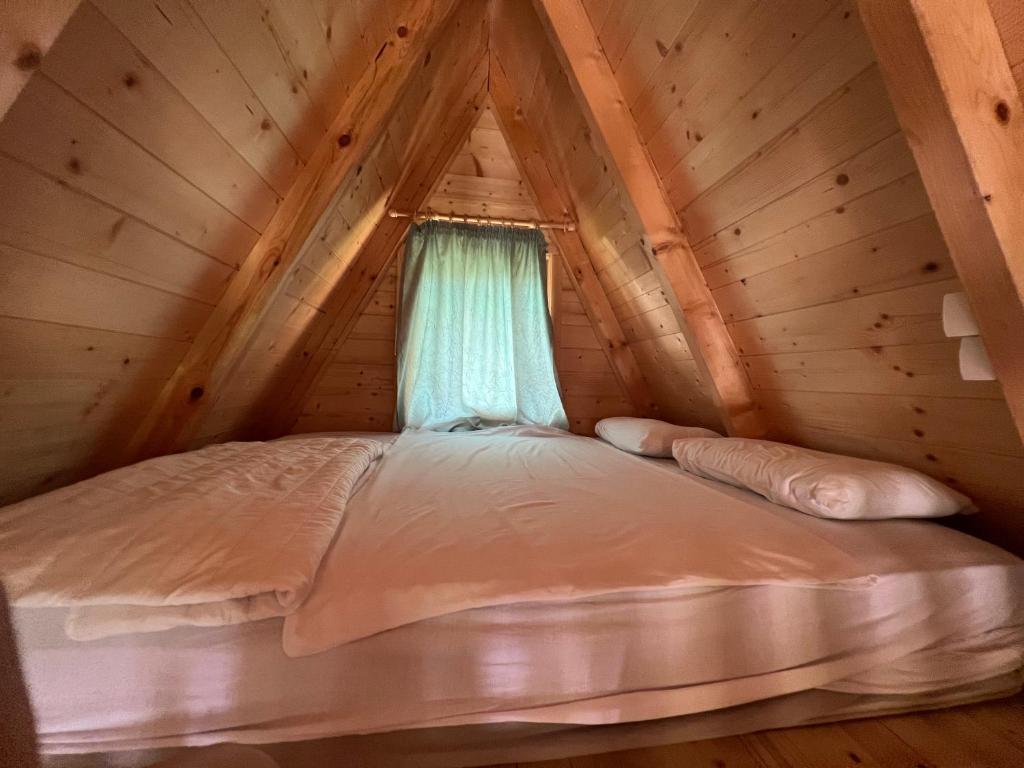 Postel nebo postele na pokoji v ubytování Bisland