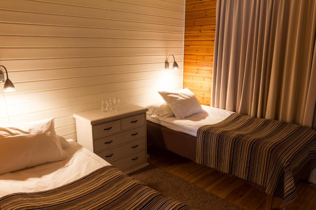 Кровать или кровати в номере Break Sokos Hotel Vuokatti