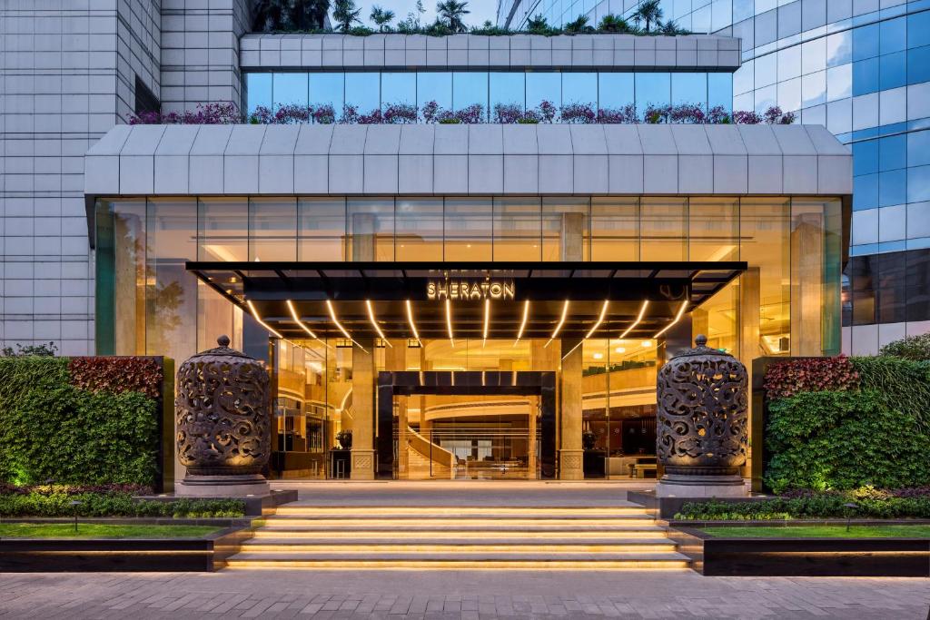 a building with the entrance to a shopping mall at Sheraton Chengdu Lido Hotel in Chengdu