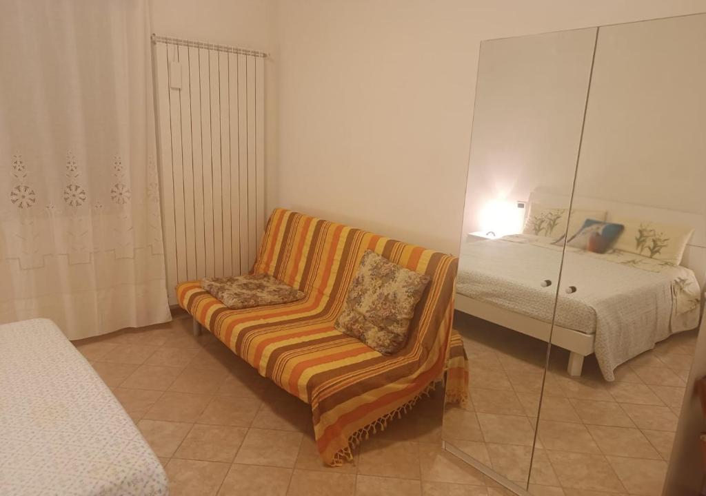 Postel nebo postele na pokoji v ubytování La casetta di Ugo