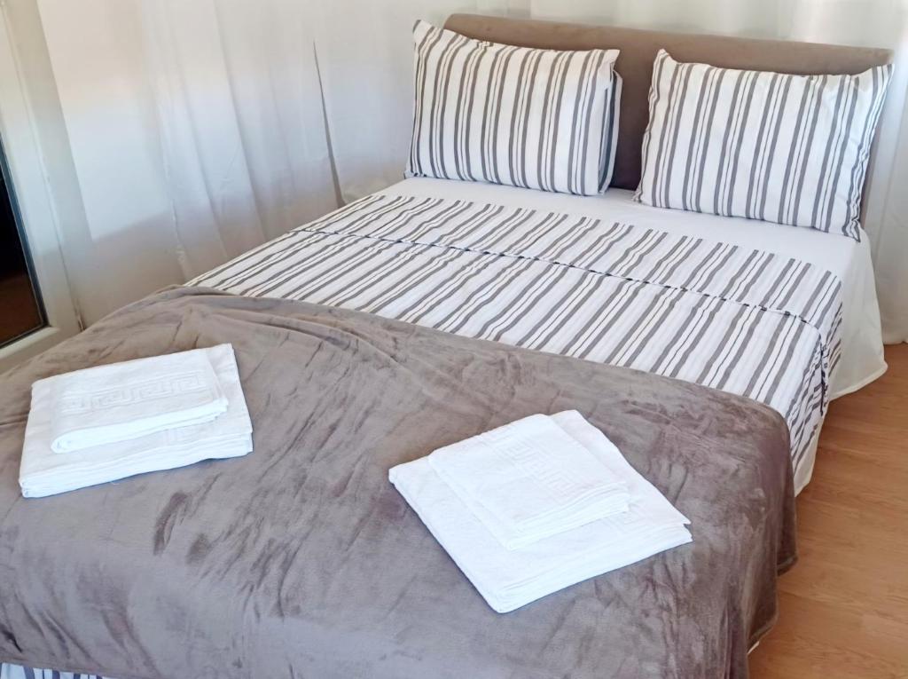 Llit o llits en una habitació de Studio Apartment Iva