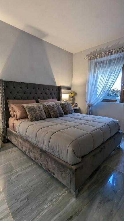 Postel nebo postele na pokoji v ubytování LA VIA DEL SALE accommodations holidays