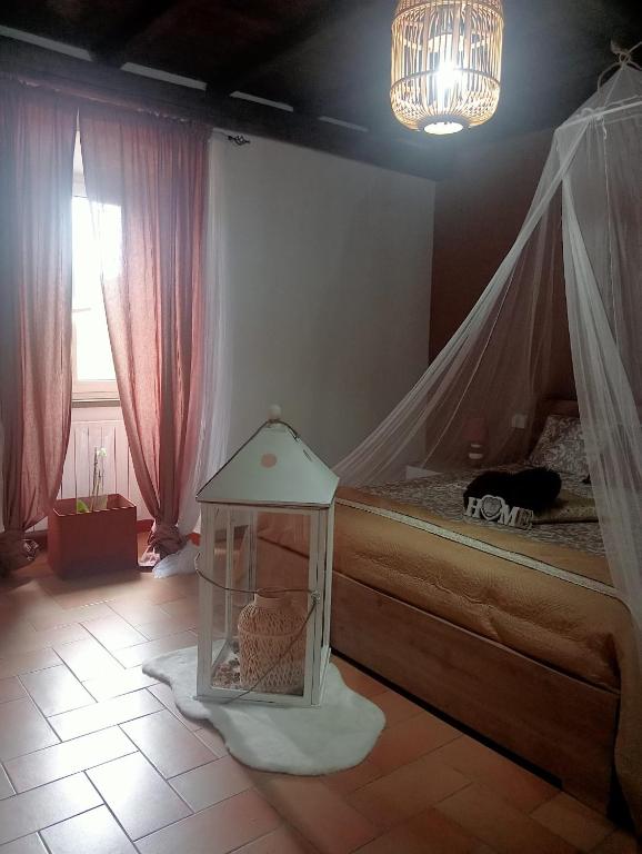 Postel nebo postele na pokoji v ubytování La soffitta di Megan
