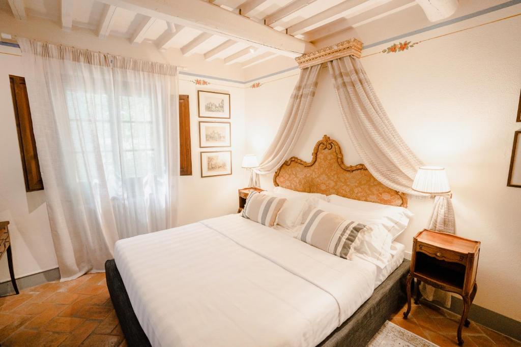 Postel nebo postele na pokoji v ubytování Equo Suites
