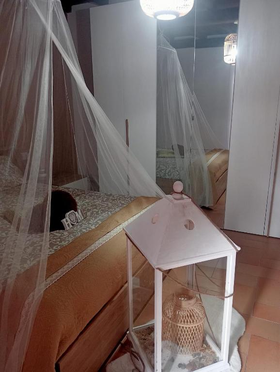 Postel nebo postele na pokoji v ubytování La soffitta di Megan