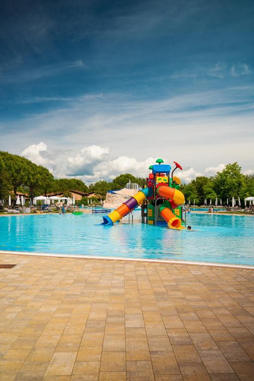 The swimming pool at or close to Villaggio Ca' Laguna