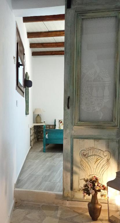 Postel nebo postele na pokoji v ubytování Ο Κήπος The Garden