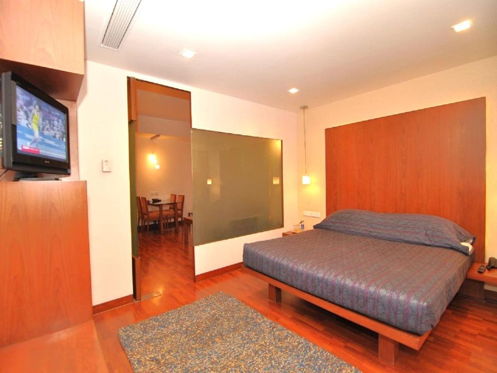 TV a/nebo společenská místnost v ubytování Hotel Studio Estique