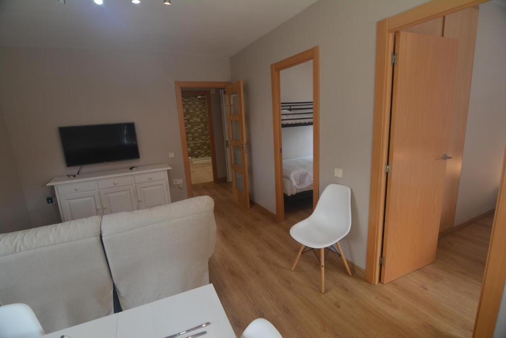 TV a/nebo společenská místnost v ubytování Palfuriana 86, a 30 metros de la playa WIFI ideal con niños (12)