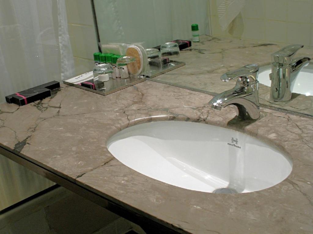 Koupelna v ubytování Hotel Studio Estique
