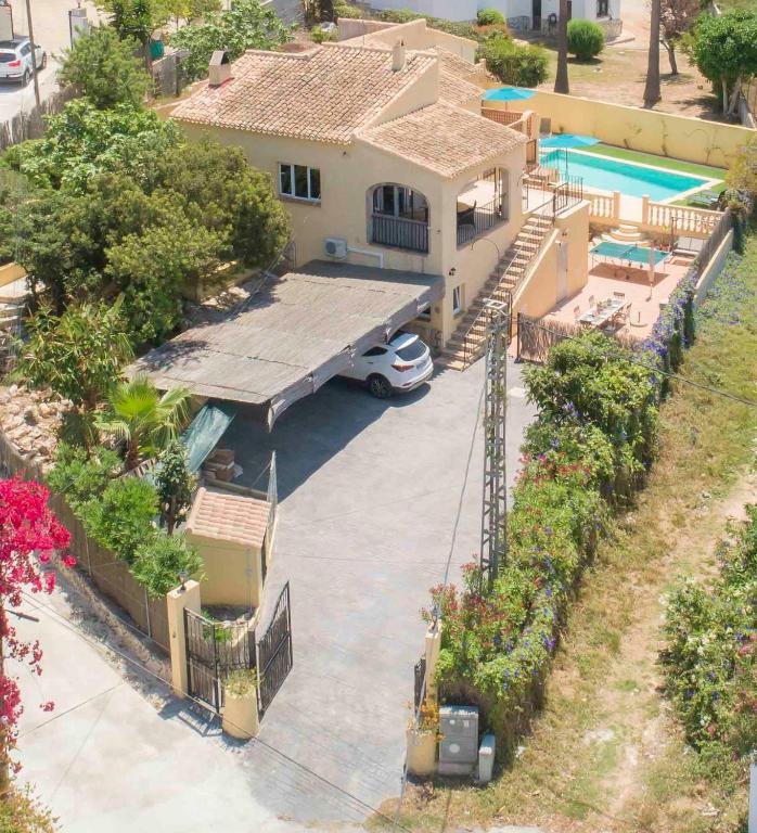 an aerial view of a house with a swimming pool at Casa Angilaga in Jávea