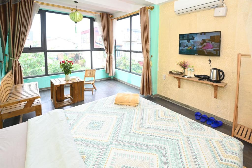 TV a/nebo společenská místnost v ubytování Sunny Hanoi Homestay