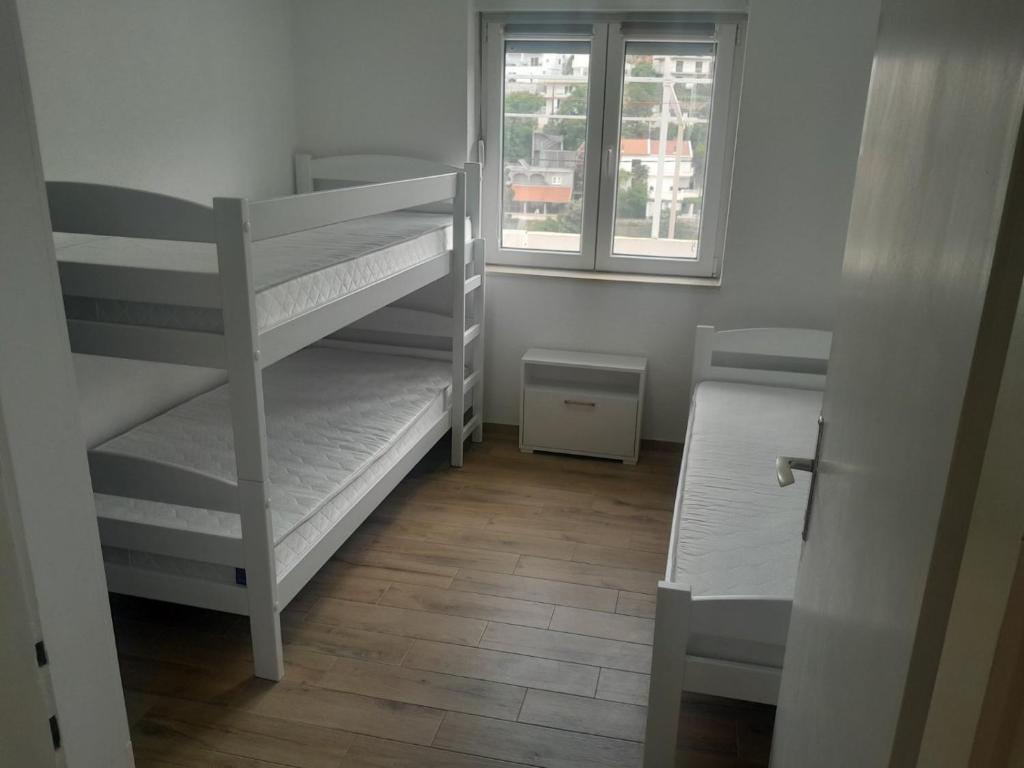 Ένα ή περισσότερα κρεβάτια σε δωμάτιο στο Amel