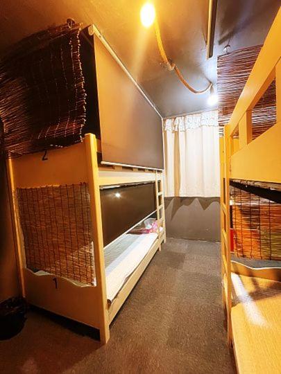 Postel nebo postele na pokoji v ubytování Doobaki Hostel