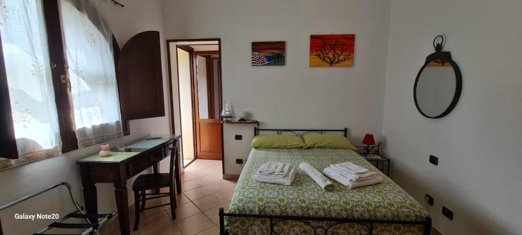 Postel nebo postele na pokoji v ubytování B&B Brezza di Mare (Sea Breeze)