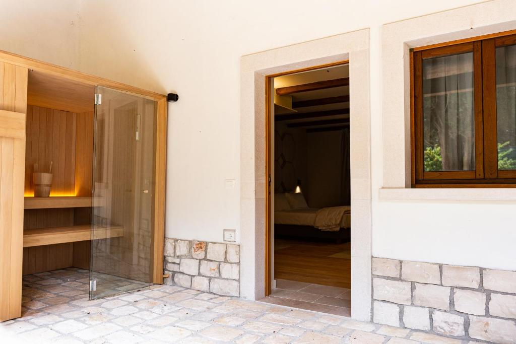 Postel nebo postele na pokoji v ubytování WINE RESORT LE VIGNE AL CASTELLO