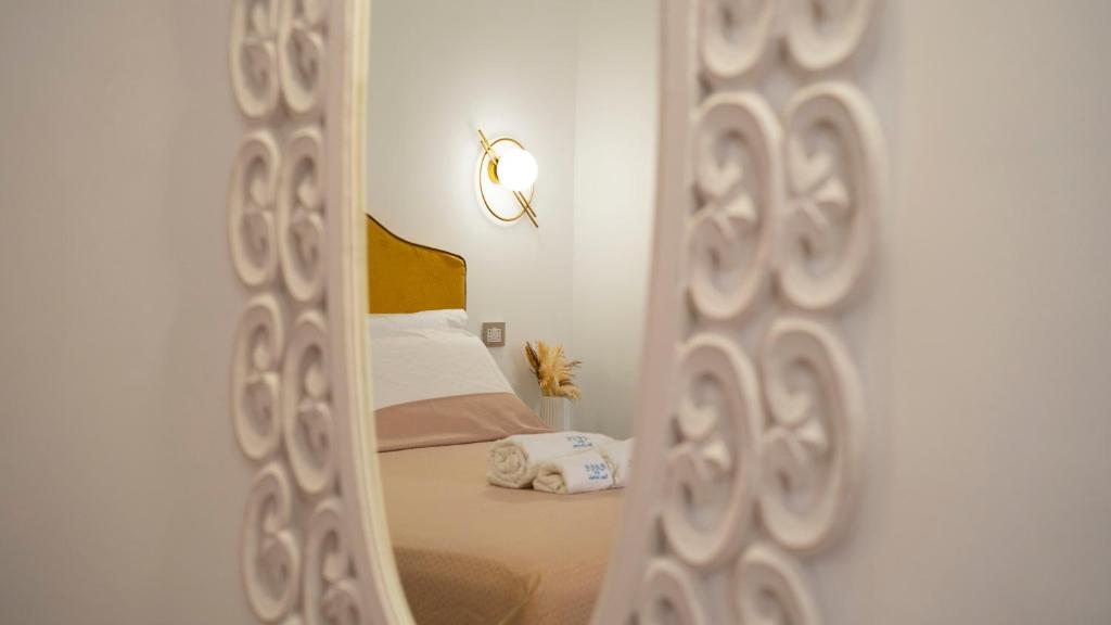 Postel nebo postele na pokoji v ubytování Boutique San Daniele