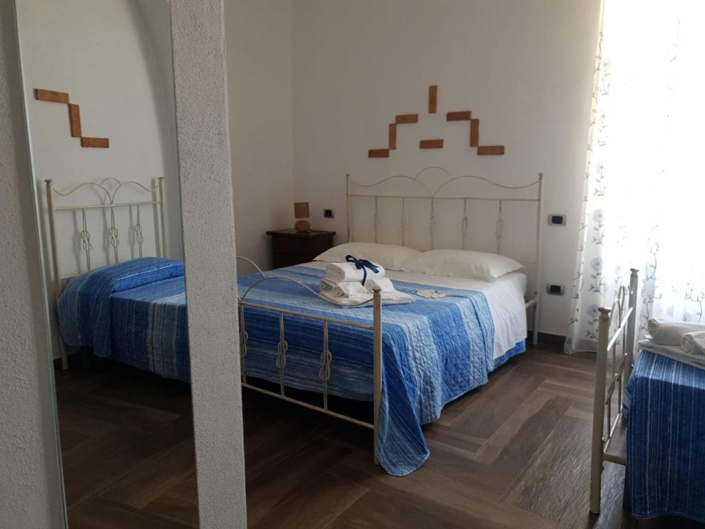 Postel nebo postele na pokoji v ubytování IL PRINCIPE