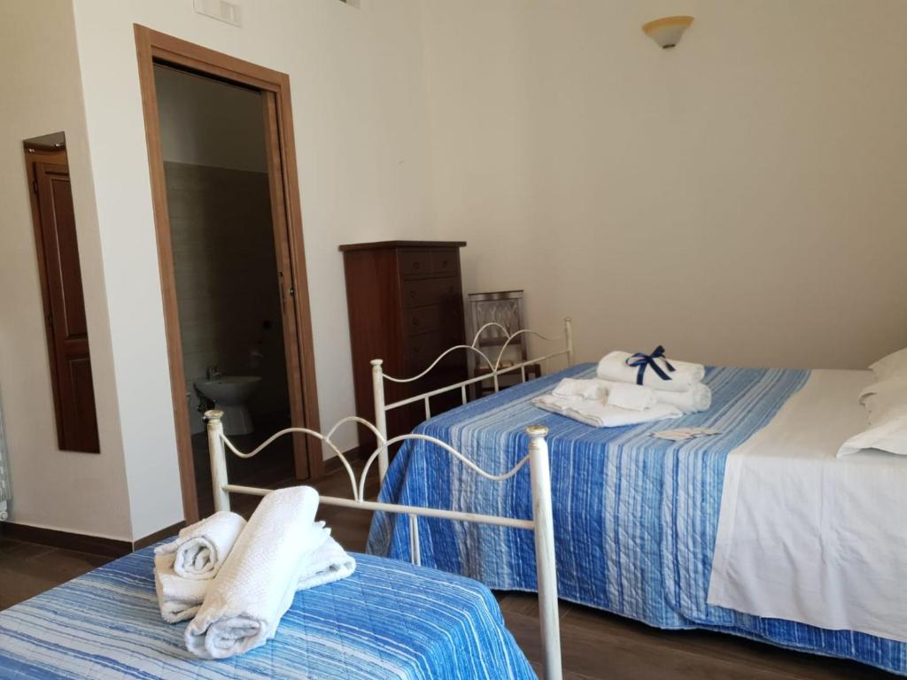 Postel nebo postele na pokoji v ubytování IL PRINCIPE