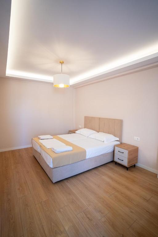 Postel nebo postele na pokoji v ubytování Illyria Hotel