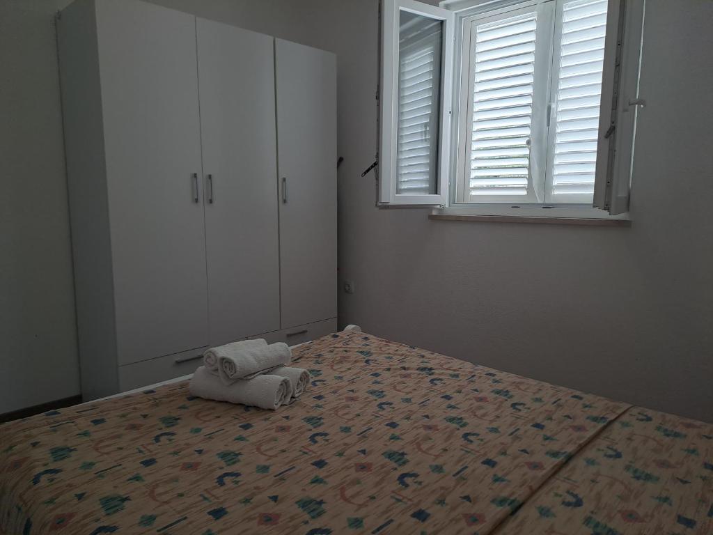 Posteľ alebo postele v izbe v ubytovaní Nane Garden house with heated pool