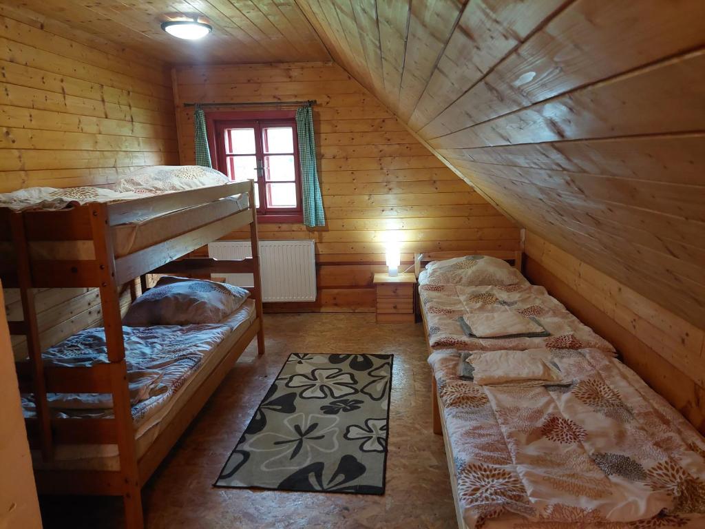 Postel nebo postele na pokoji v ubytování Chalupa Jadrná 1