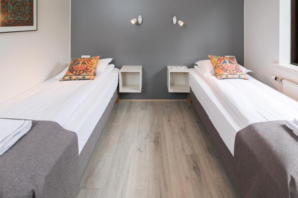 Voodi või voodid majutusasutuse Brekkugerdi Guesthouse toas
