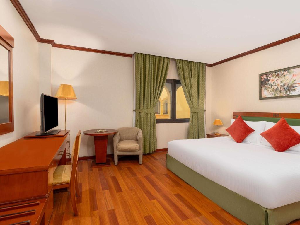 Postel nebo postele na pokoji v ubytování MOVE INN Jeddah Hotel