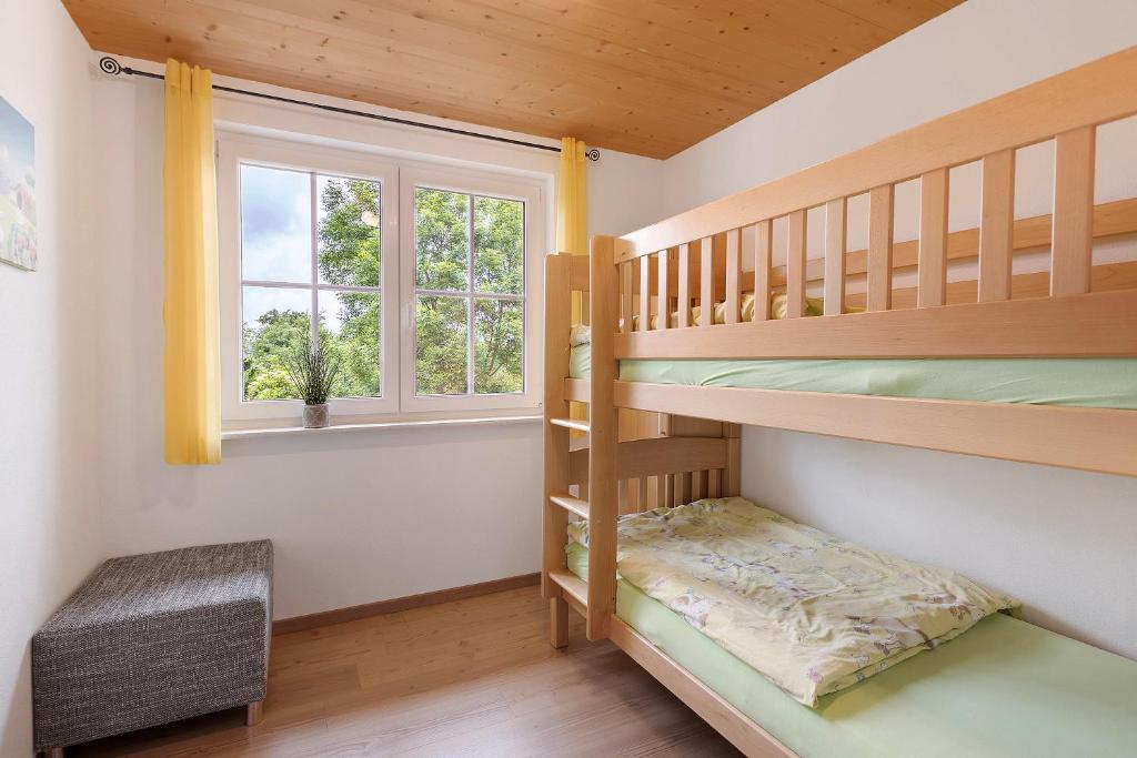 Postel nebo postele na pokoji v ubytování Ferienhaus Heerlichkeit
