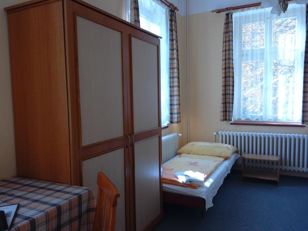 Postel nebo postele na pokoji v ubytování Marianum JL,s.r.o.