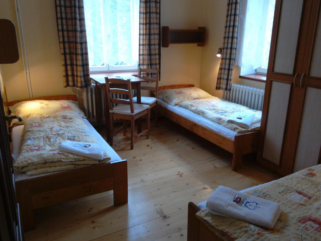 Postel nebo postele na pokoji v ubytování Marianum JL,s.r.o.