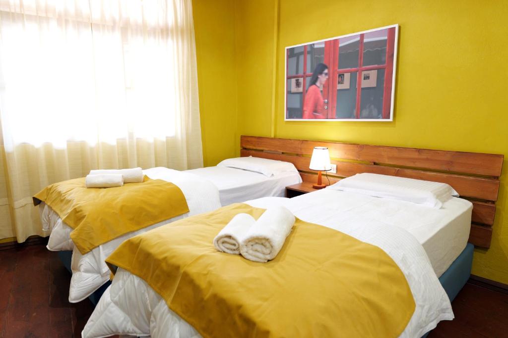 Postel nebo postele na pokoji v ubytování Guesthouse n'Odë