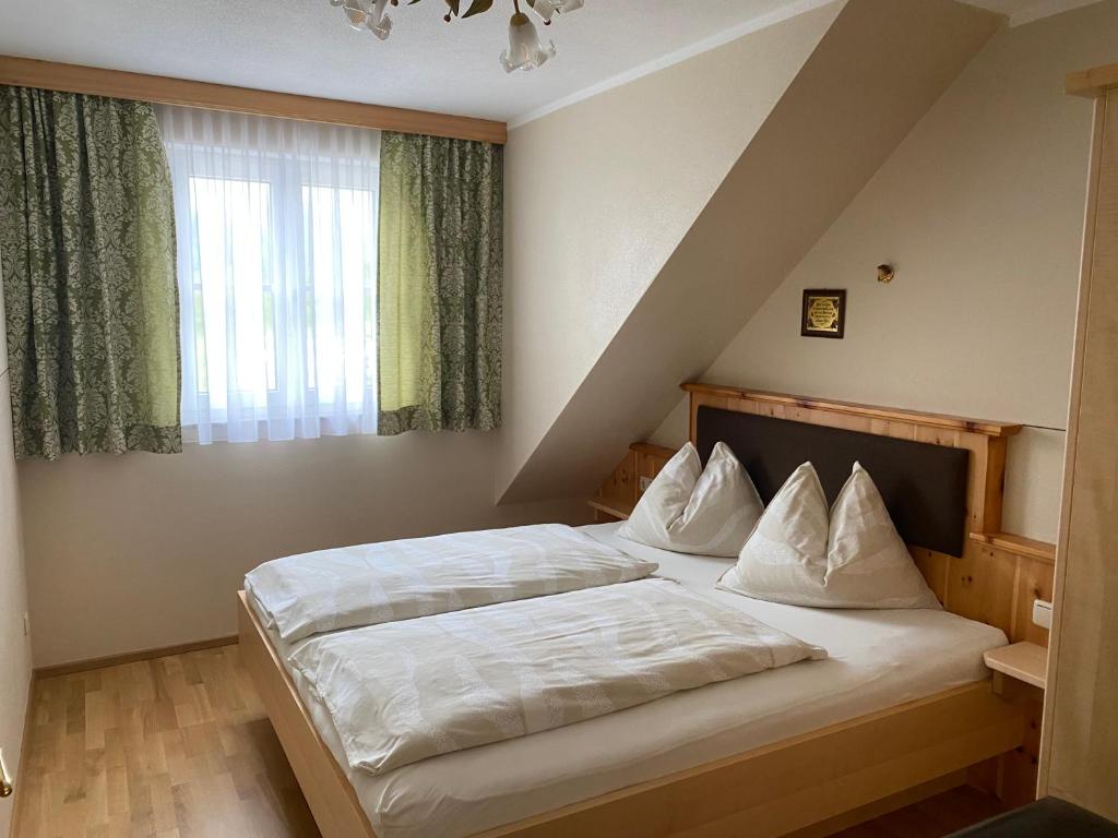 Postel nebo postele na pokoji v ubytování Maislbauer